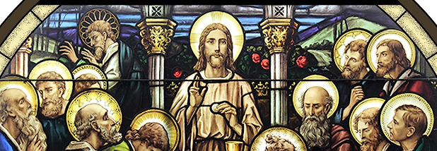 Stained glass window of the Last Supper with Christ at center and apostles surrounding him